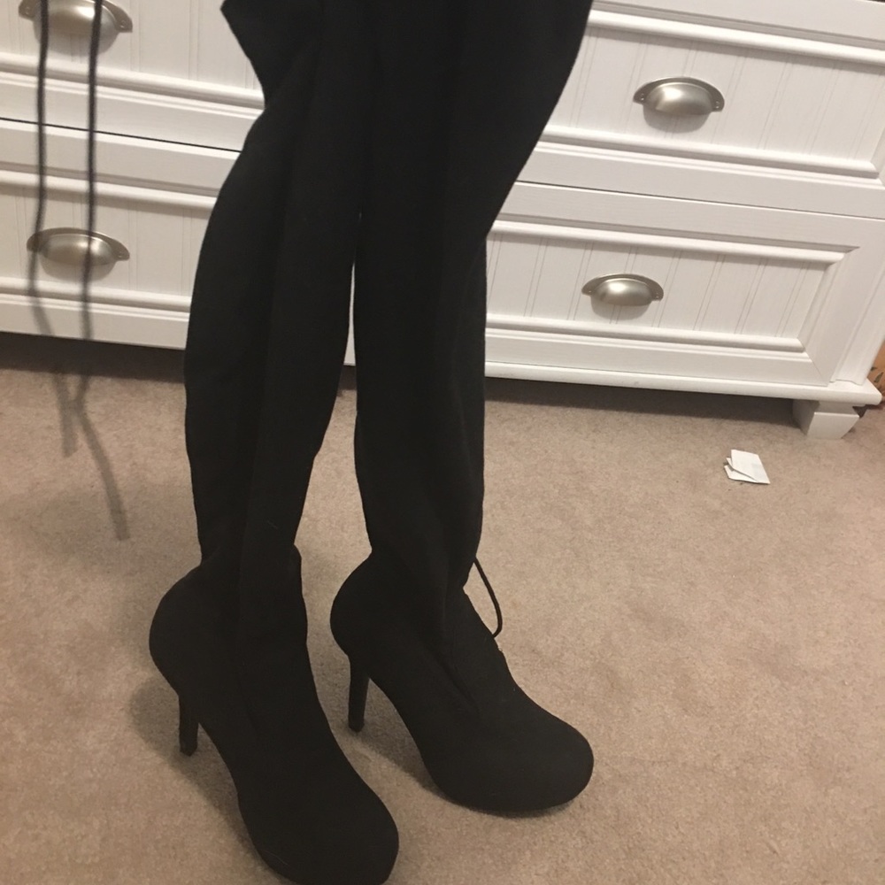 Black thigh high heel boots